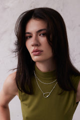 Silver necklace with carabiner closing Sadie on model